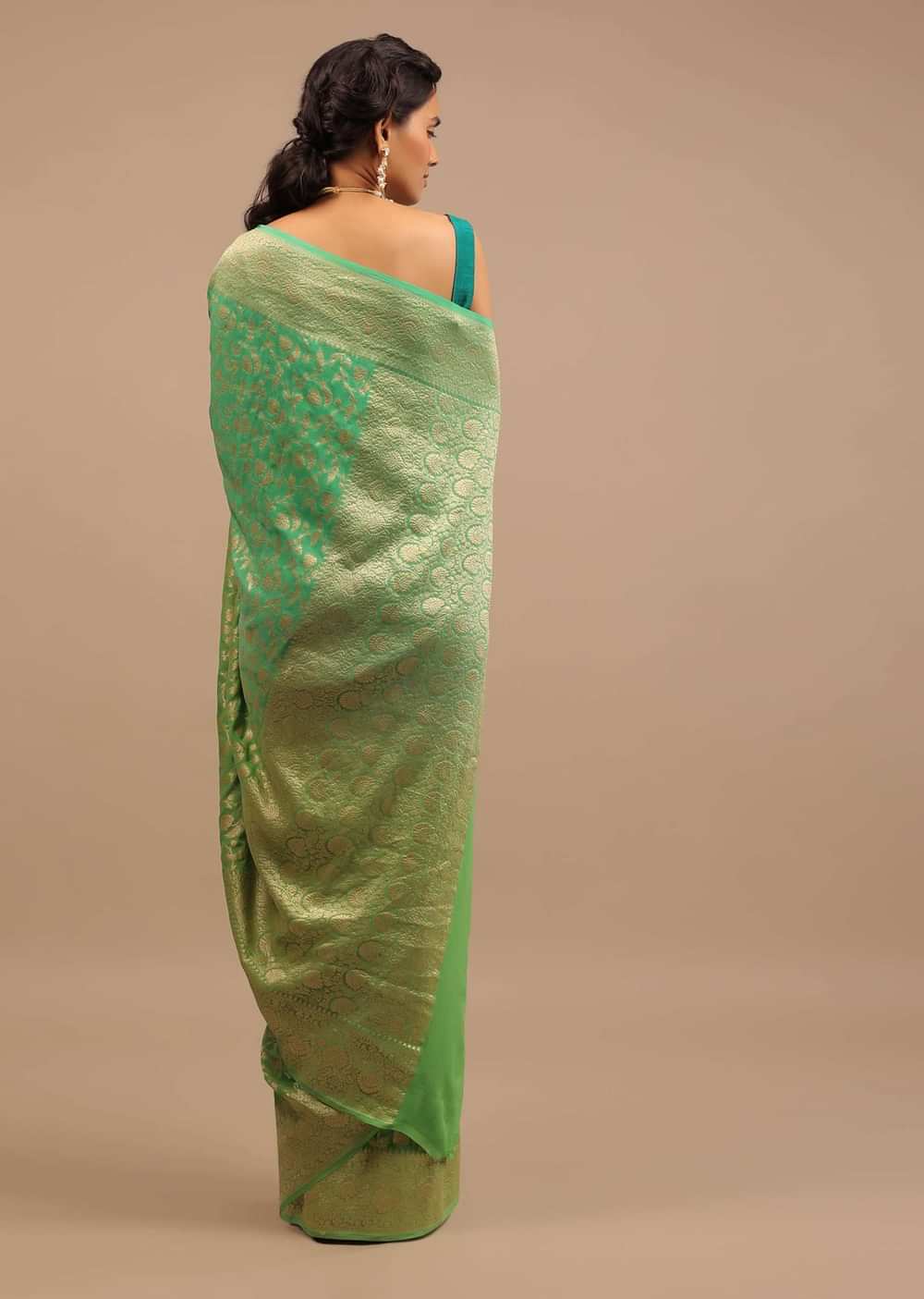 Mint Green Saree With Jaal Work On The Border And Pallu
