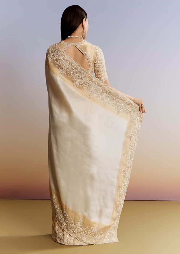 Ivory And Golden Kora Silk Saree With Heavy Zardosi Work