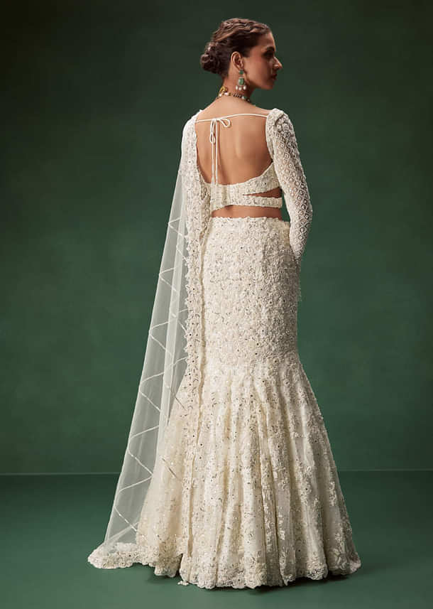 Ivory Mermaid Bridal Lehenga With Full Sleeves And Heavy Embroidery