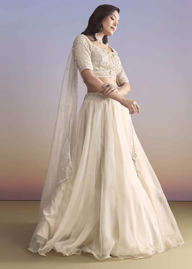 Ivory Organza Bridesmaid Lehenga With Sequins And Cutdana Embroidery