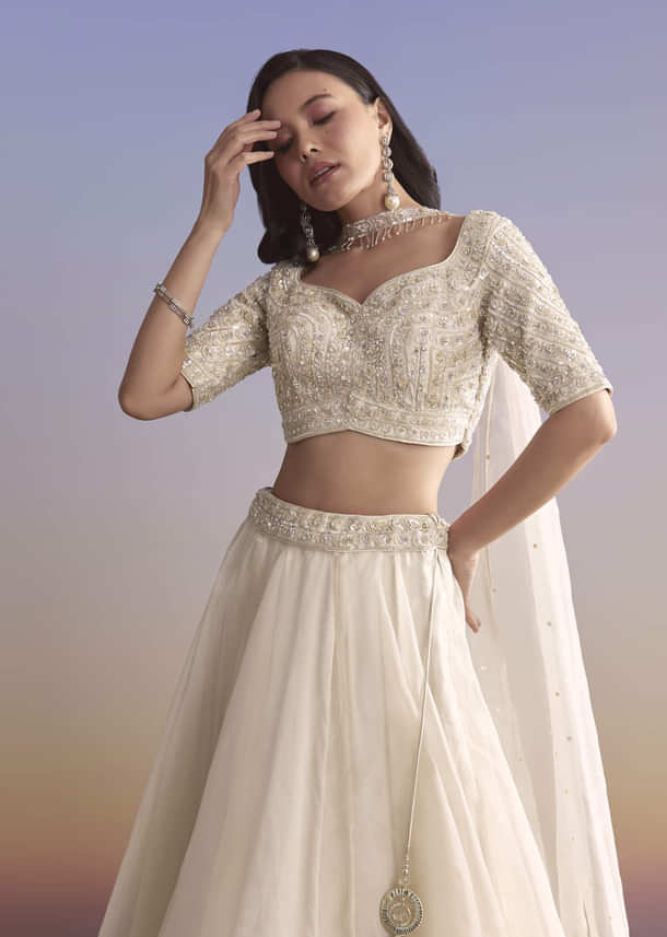 Ivory Organza Bridesmaid Lehenga With Sequins And Cutdana Embroidery