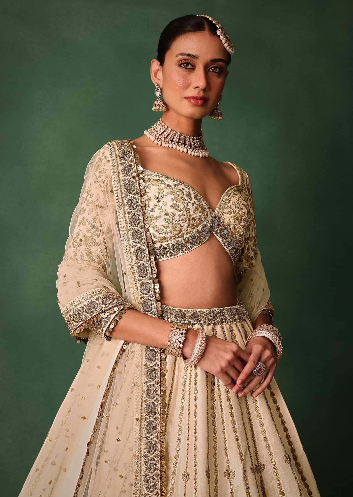 Ivory Raw Silk Hand Embroidered Lehenga Set With Net Dupatta