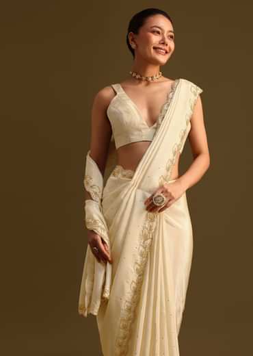 Ivory Tissue Saree With Cutdana Embroidered Border and Unstitched Blouse