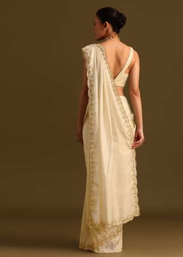 Ivory Tissue Saree With Cutdana Embroidered Border and Unstitched Blouse