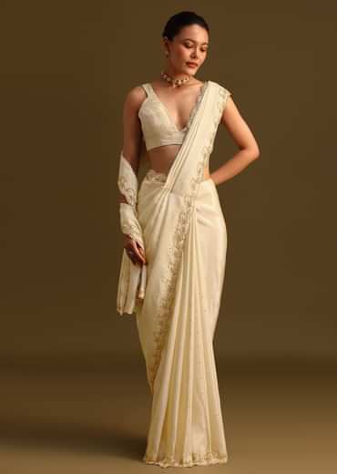 Ivory Tissue Saree With Cutdana Embroidered Border and Unstitched Blouse