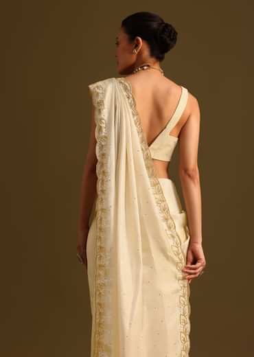 Ivory Tissue Saree With Cutdana Embroidered Border and Unstitched Blouse