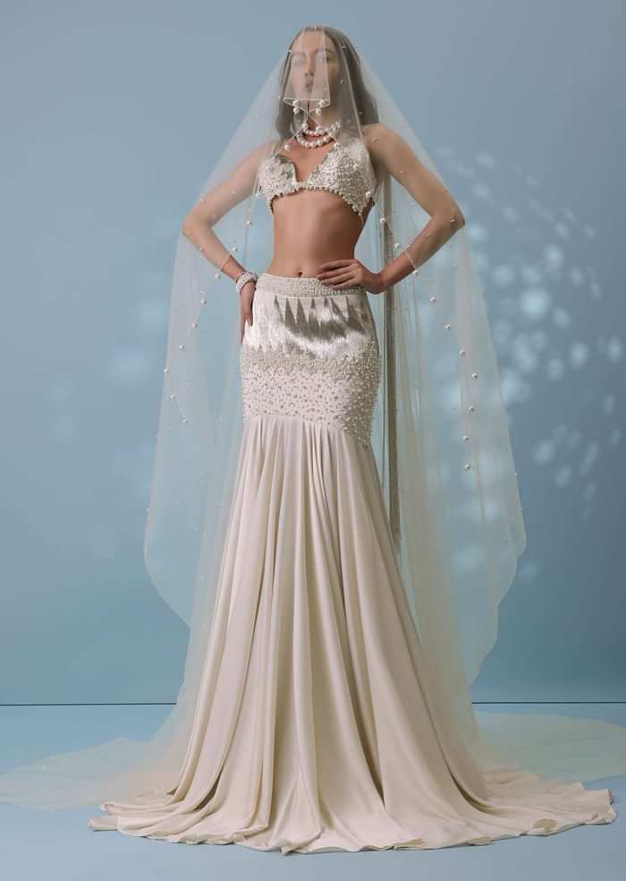 Ivory White Embroidered Trail Lehenga Set In Milano Satin With Tassel Blouse