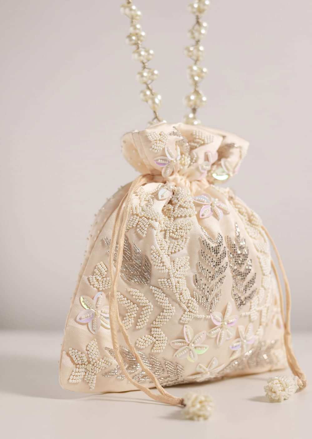 Ivory White Raw Silk Potli Bag With Motif Detailing