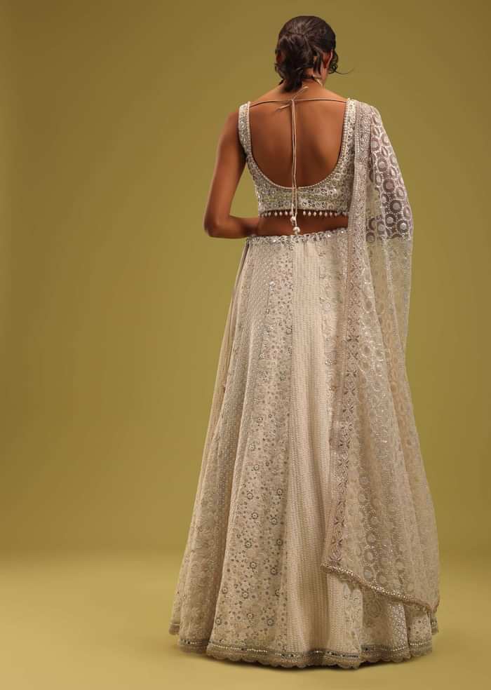 Ivory White Zari Embroidered Lehenga And Blouse Set In Georgette