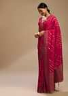 Rani Pink Saree In Dola Silk With Multi Colored Woven Diagonal Stripes And Floral Border