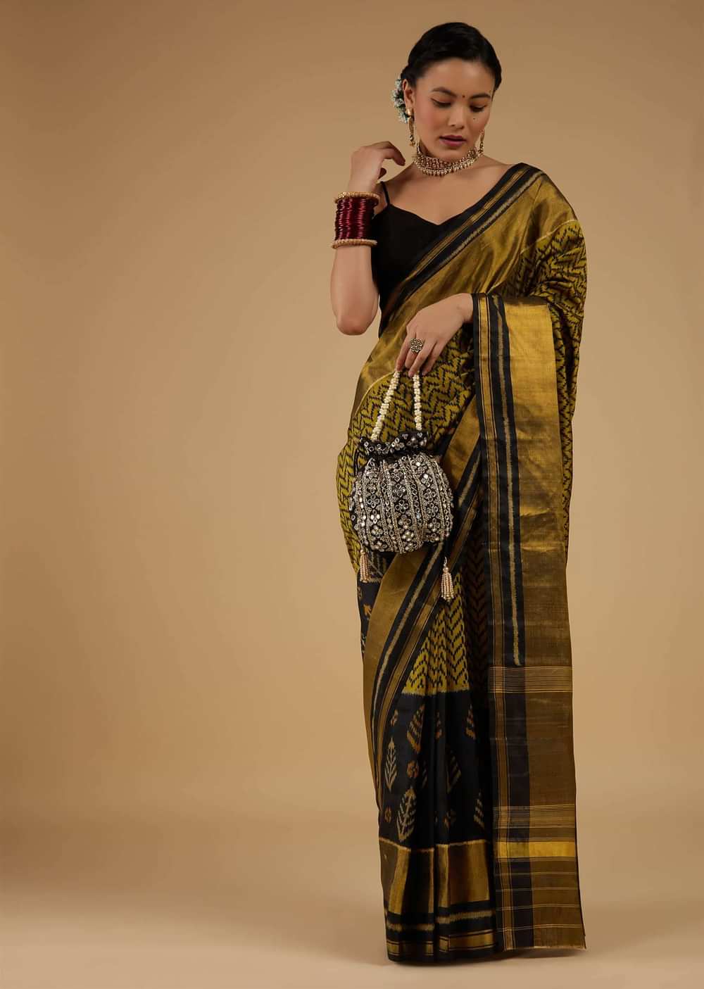 Moss Green And Black Saree In Silk With Ikat Weave Patola Geometric Work