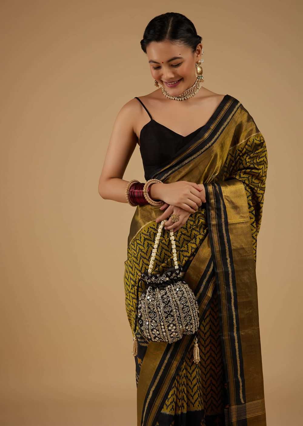 Moss Green And Black Saree In Silk With Ikat Weave Patola Geometric Work