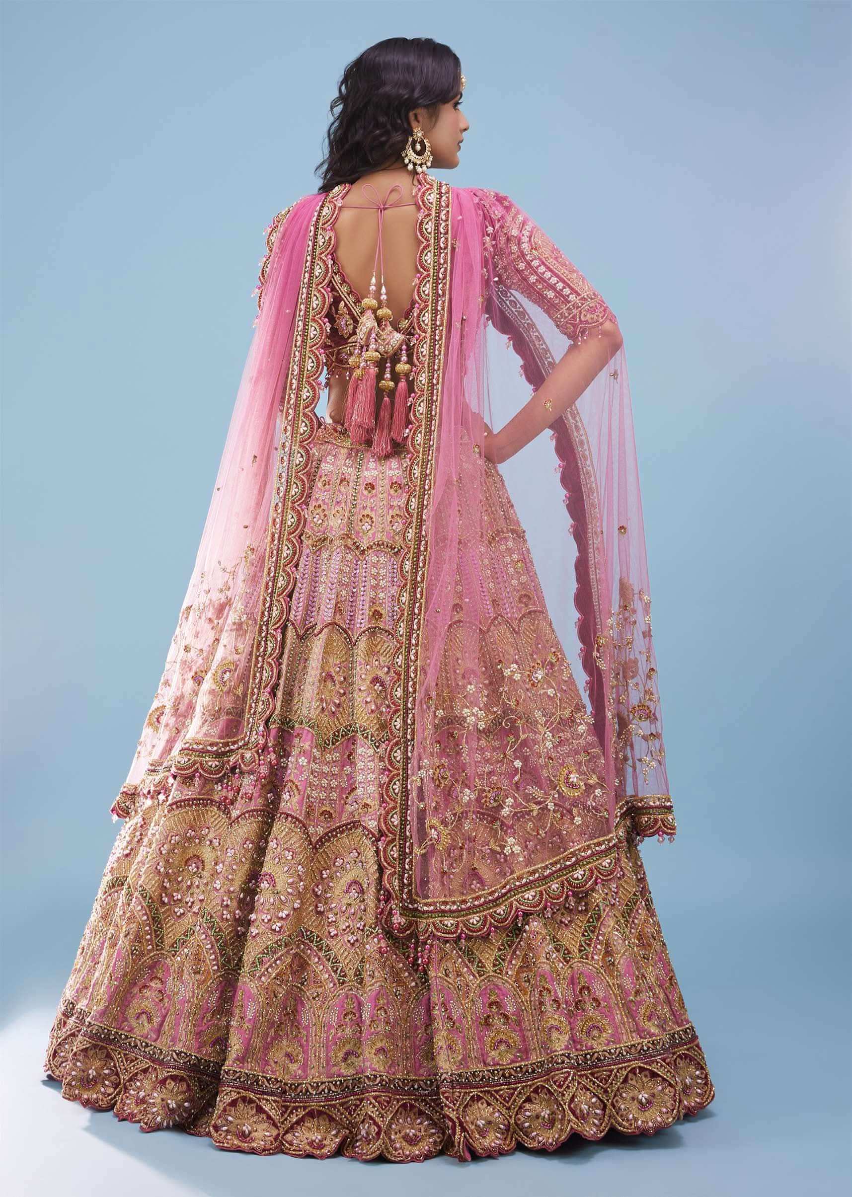 Rose Pink Junoesque Bridal Lehenga In Raw Silk With Heavy Embroidery - NOOR 2022