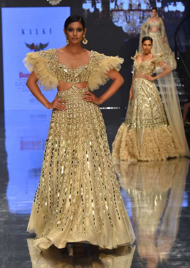 Champagne Gold Angelic Net Gown With Mirror Work And Ruffle Sleeves - NOOR 2022