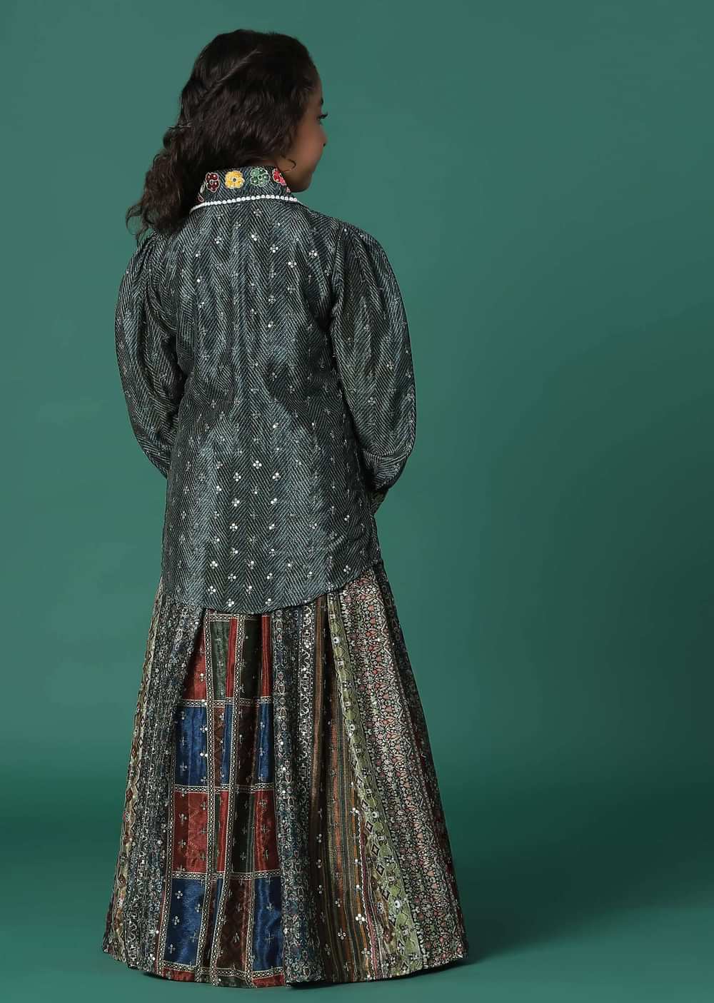 Kalki Multi Colored Top And Skirt Set In Satin Blend With A Matching Sling Bag