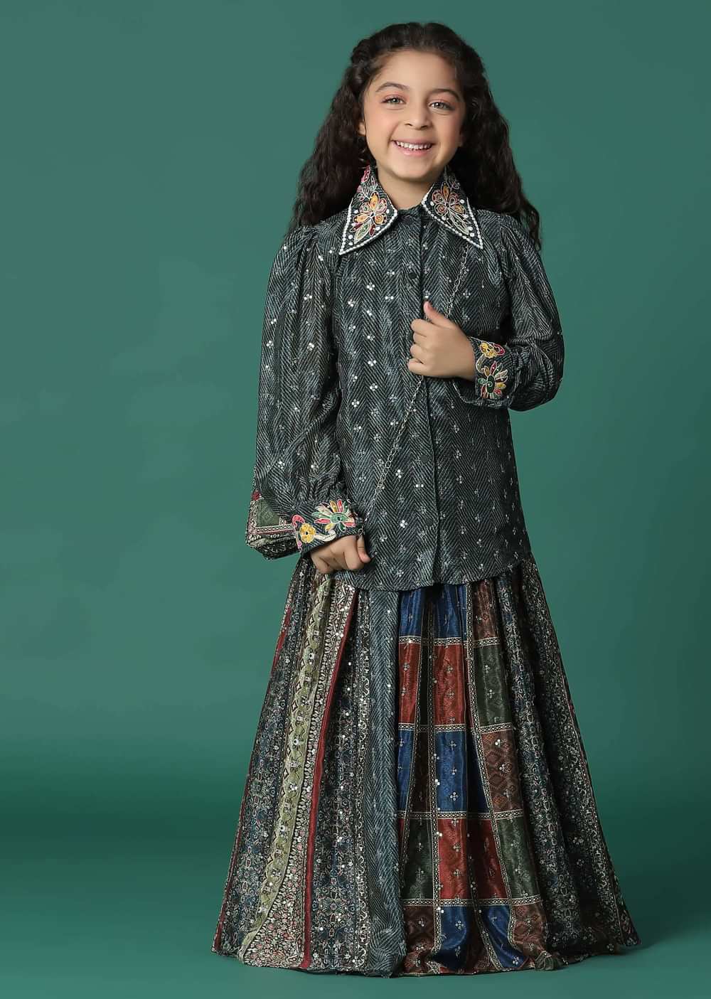 Kalki Multi Colored Top And Skirt Set In Satin Blend With A Matching Sling Bag