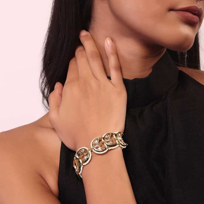 Kundan And Pearl Bracelet In Gold Tone
