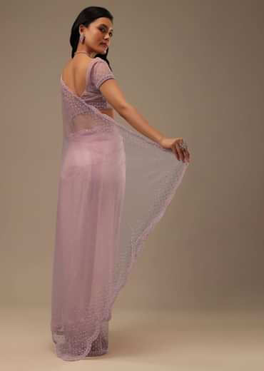 Lavender Pink Stone And Beads Embellished Net Saree
