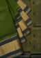 Leaf green saree in silk beautified in weaved embroidery only on Kalki
