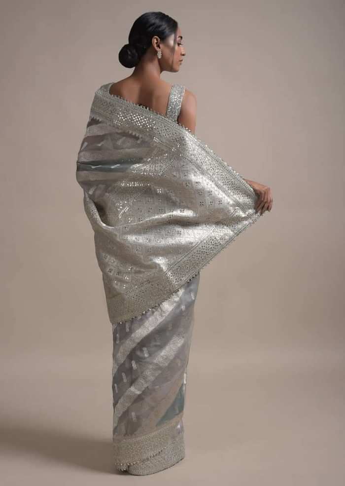 Light And Dark Grey Shaded Saree In Organza With Weaved Floral Pattern In Diagonal Stripes Online - Kalki Fashion