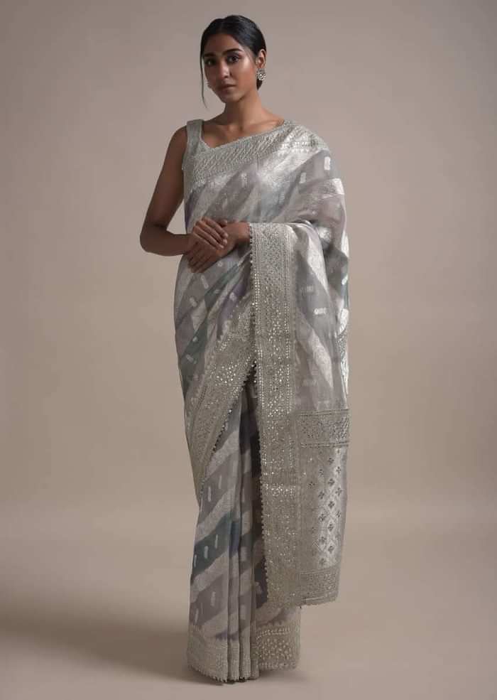 Light And Dark Grey Shaded Saree In Organza With Weaved Floral Pattern In Diagonal Stripes Online - Kalki Fashion