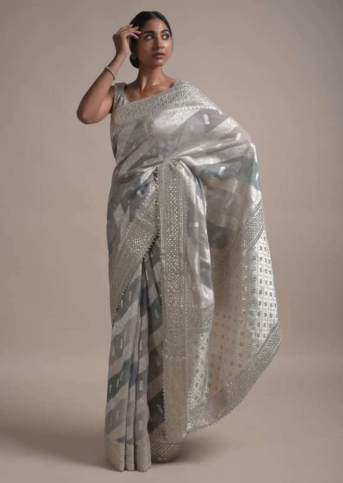 Light And Dark Grey Shaded Saree In Organza With Weaved Floral Pattern In Diagonal Stripes Online - Kalki Fashion