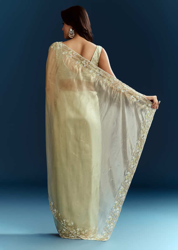 Light Pista Organza Saree With Floral Cutdana And Stone Embroidery Light Pista Organza Saree With Floral Cutdana And Stone Embroidery