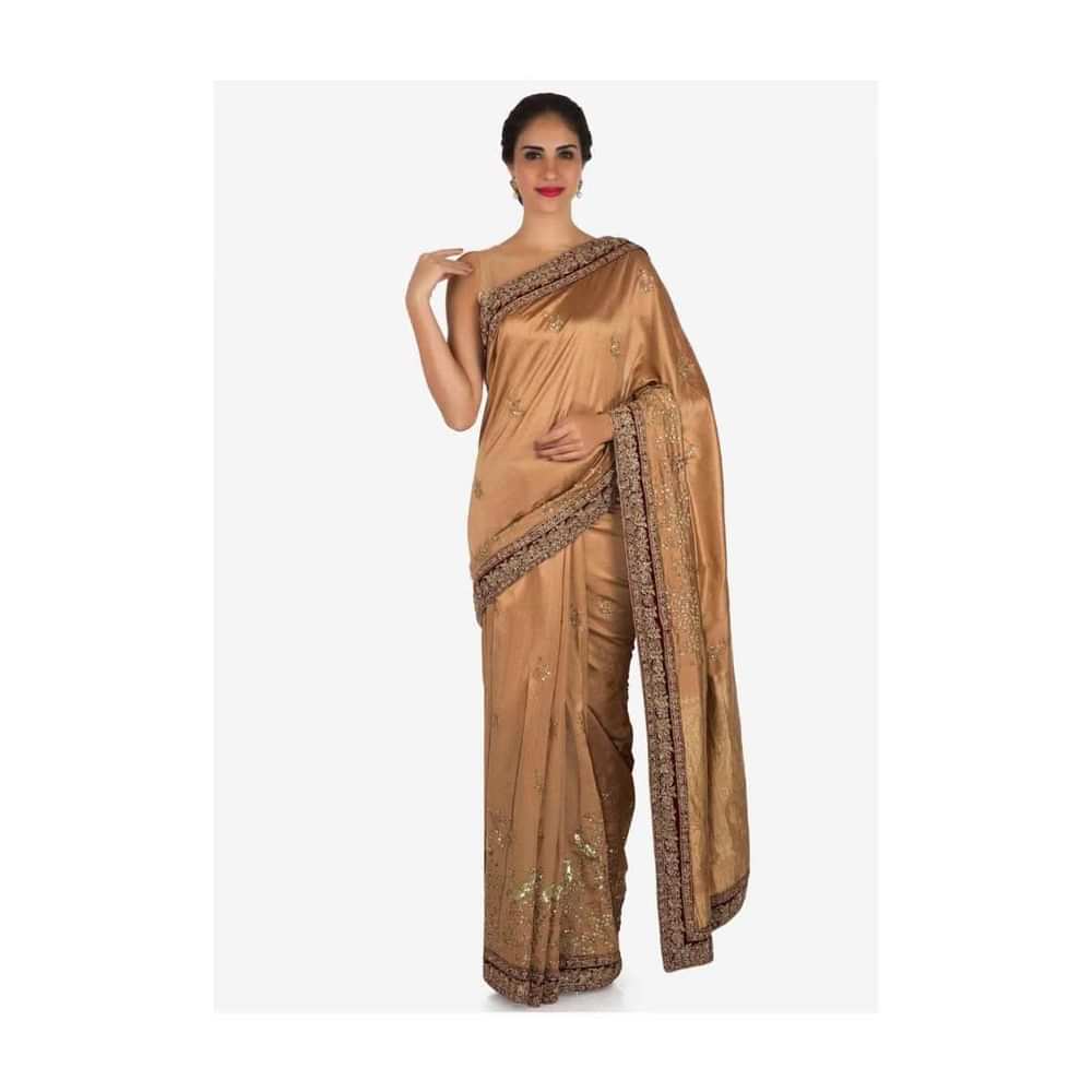 Light brown saree in cotton silk embellished in heavy sequin bird motif work only on Kalki