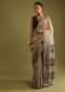Light Taupe Saree In Tussar Silk With Black And Golden Woven Border And Textured Tussar Detailing On The Pallu Online - Kalki Fashion