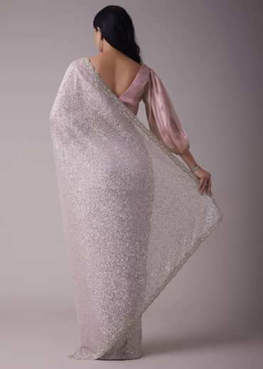 Lavender Purple Sequins Saree With An Embellished Border