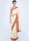 Lime yellow silk saree with floral embroidered butti and border only on Kalki
