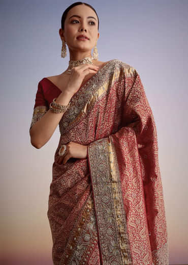 Maroon Jacquard Silk Saree With Heavy Embroidered Border And Pallu