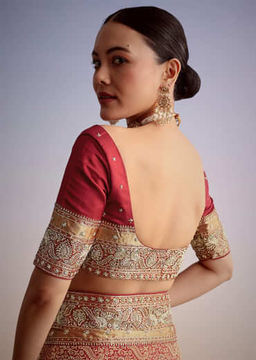 Maroon Jacquard Silk Saree With Heavy Embroidered Border And Pallu