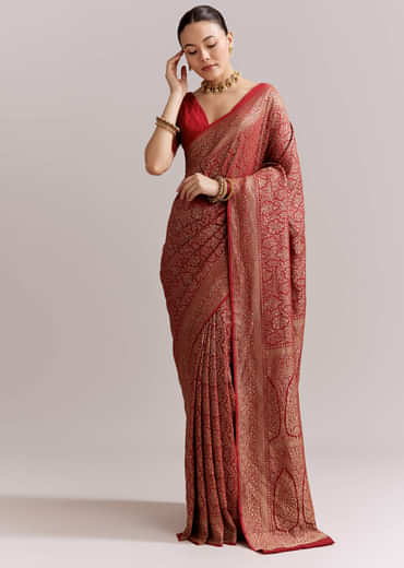 Maroon Silk Woven Brocade Saree With Zari And Floral Border