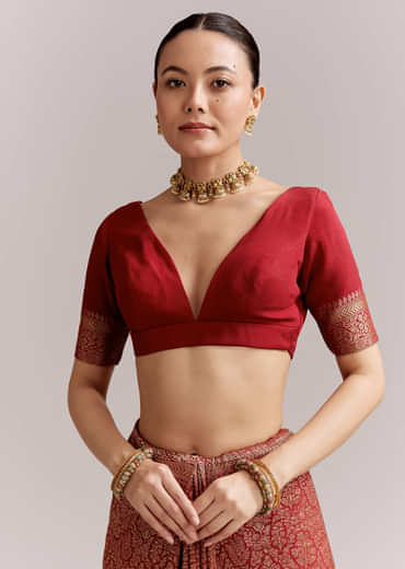 Maroon Silk Woven Brocade Saree With Zari And Floral Border