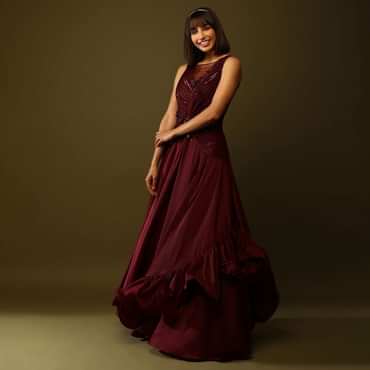 Maroon Gown With Ruched Bodice And Fancy Ruffled Hem