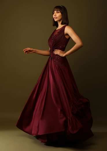 Maroon Gown With Ruched Bodice And Fancy Ruffled Hem