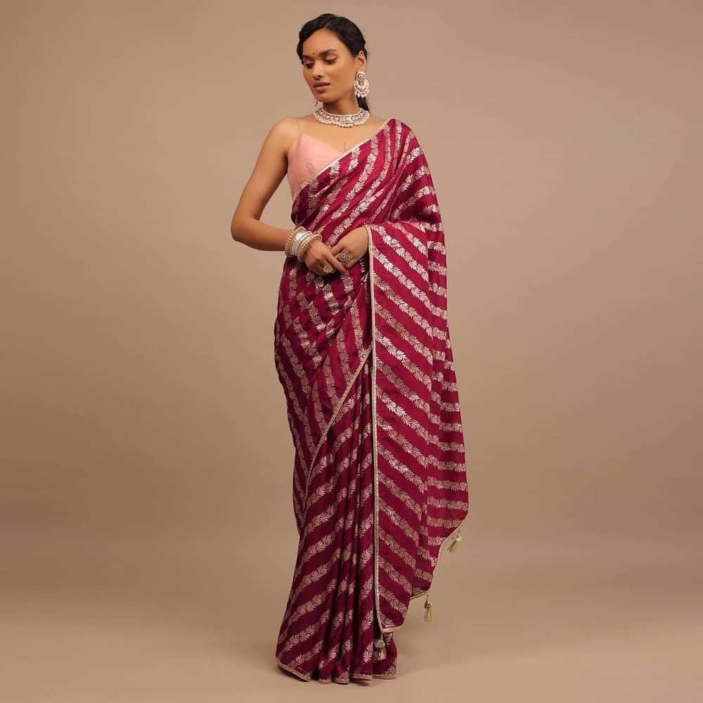 Maroon Red Saree In Dola Silk With Woven Floral Design In Diagonal Stripes And Lace Detailing