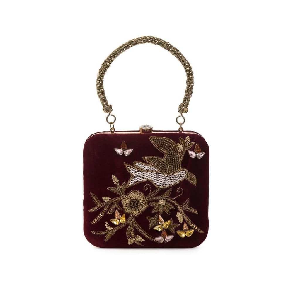 Maroon sequins and cutdana clutch in floral and bird motif