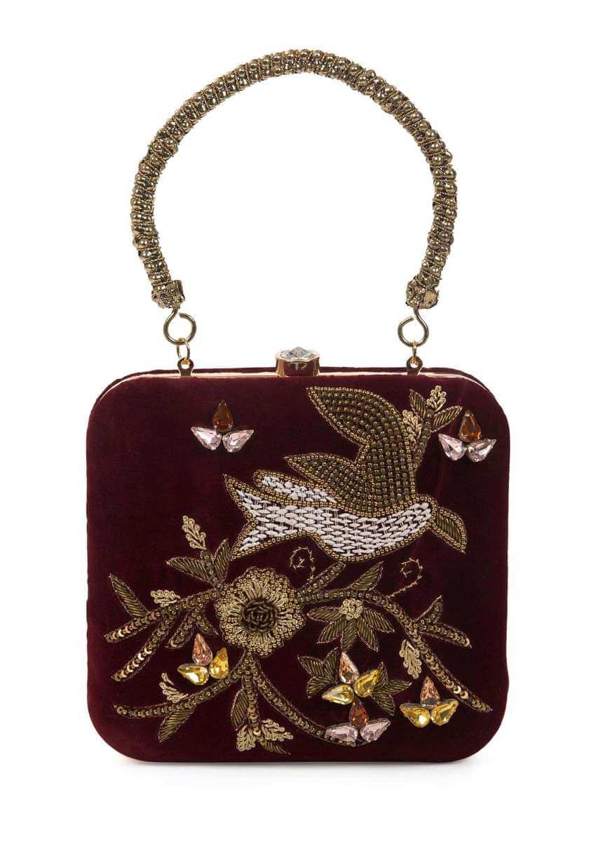Maroon sequins and cutdana clutch in floral and bird motif