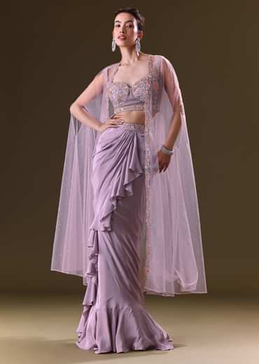 Mauve Ruffled Drape Skirt With Embroidered Blouse And Net Cape