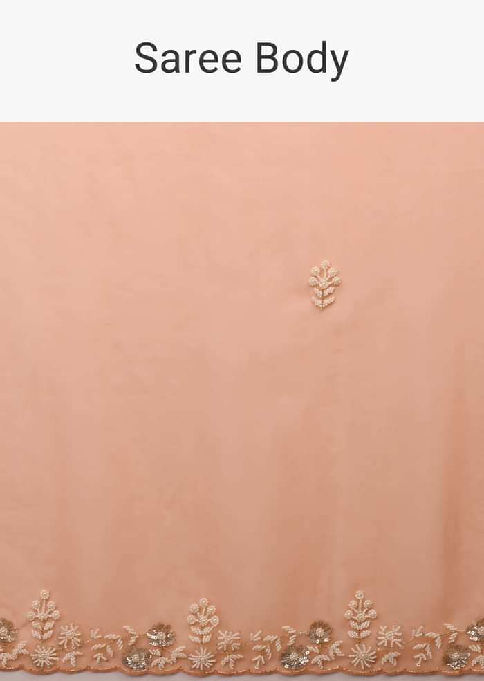 Melon Orange Saree In Organza With Hand Embroidered Moti And Sequin Work On The Border And Butti Design