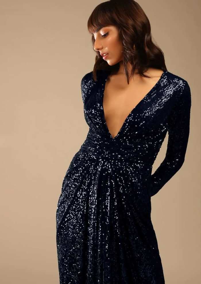Midnight Blue Sequins Gown With Plunging V Neckline And Ruched Belt Along With Gathers In The Front
