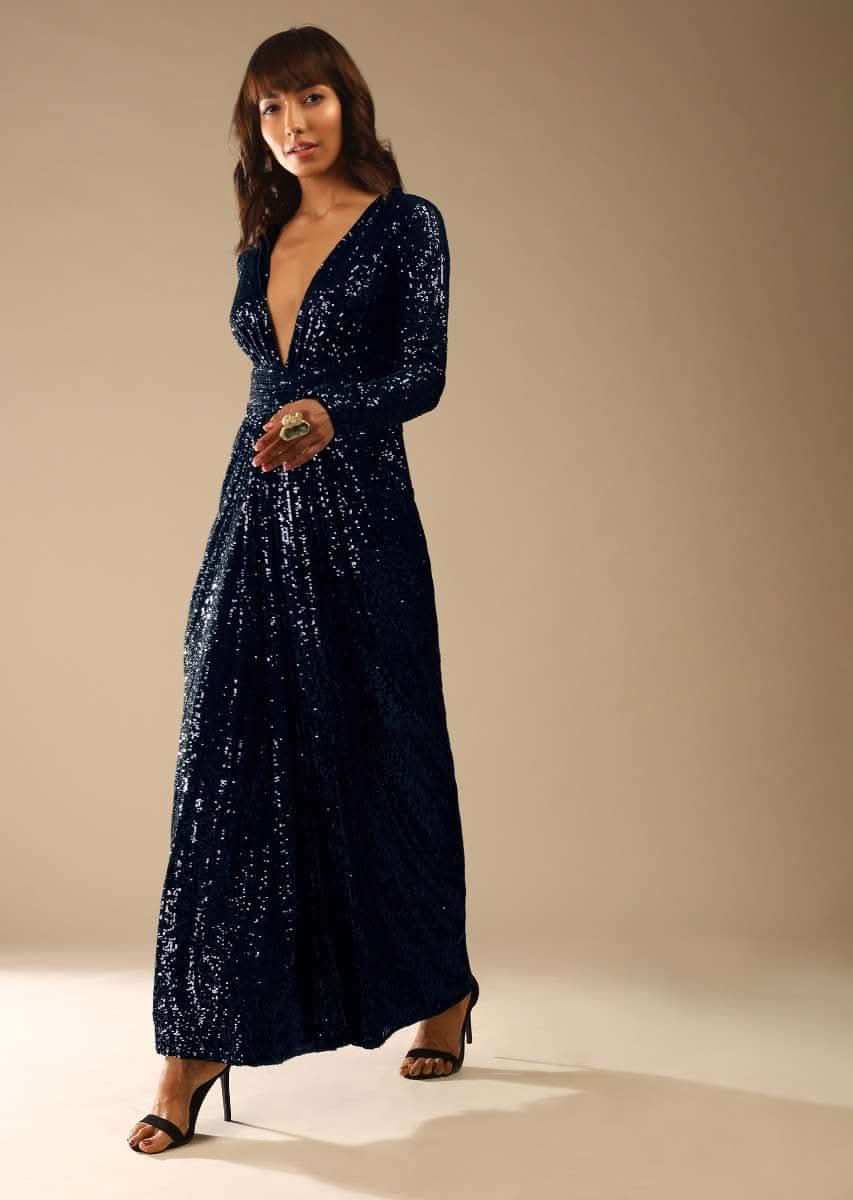 Midnight Blue Sequins Gown With Plunging V Neckline And Ruched Belt Along With Gathers In The Front