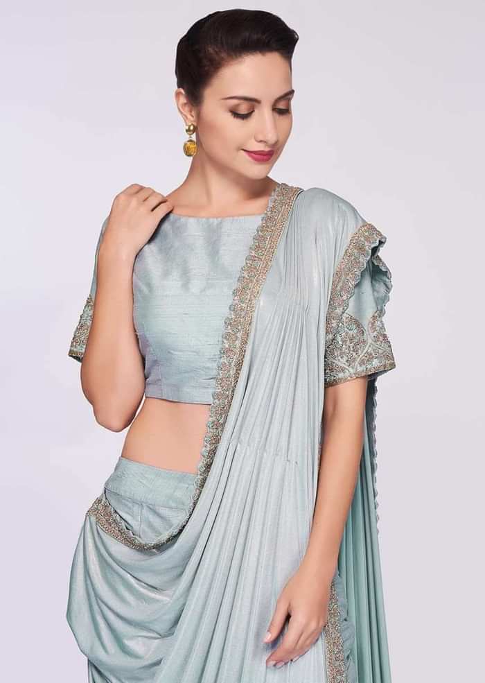 Mint blue saree with pant enhanced with a lycra top layer only on Kalki