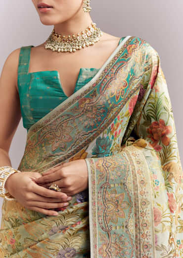 Mint Green Dola Silk Woven Saree With Embroidered Nature Motifs Mint Green Dola Silk Woven Saree With Embroidered Nature Motifs