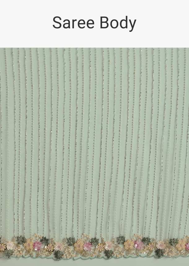 Mint Green Net Saree With Heavily Embroidered Border