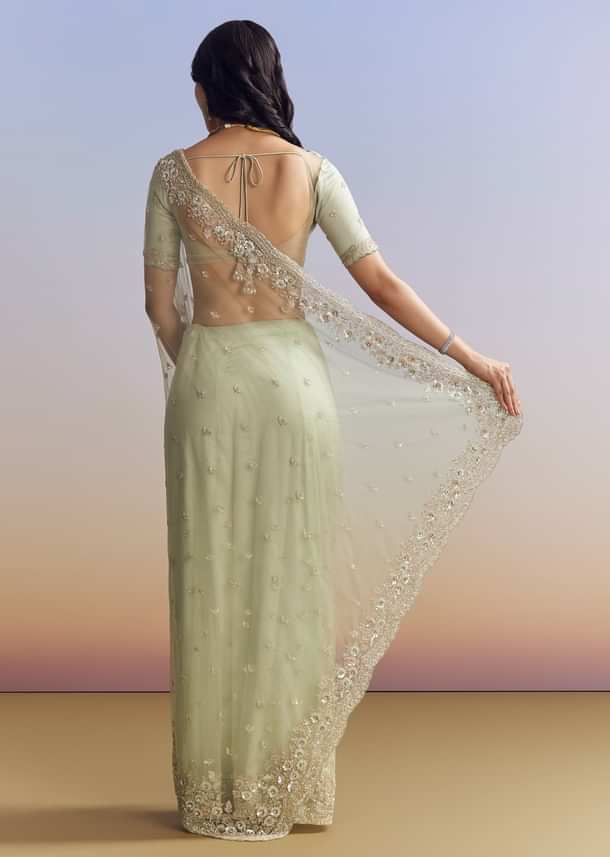 Mint Green Net Saree With Scallop Border And Heavy Embroidery