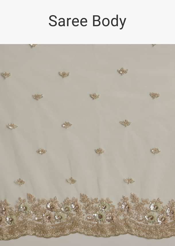 Mint Green Net Saree With Scallop Border And Heavy Embroidery