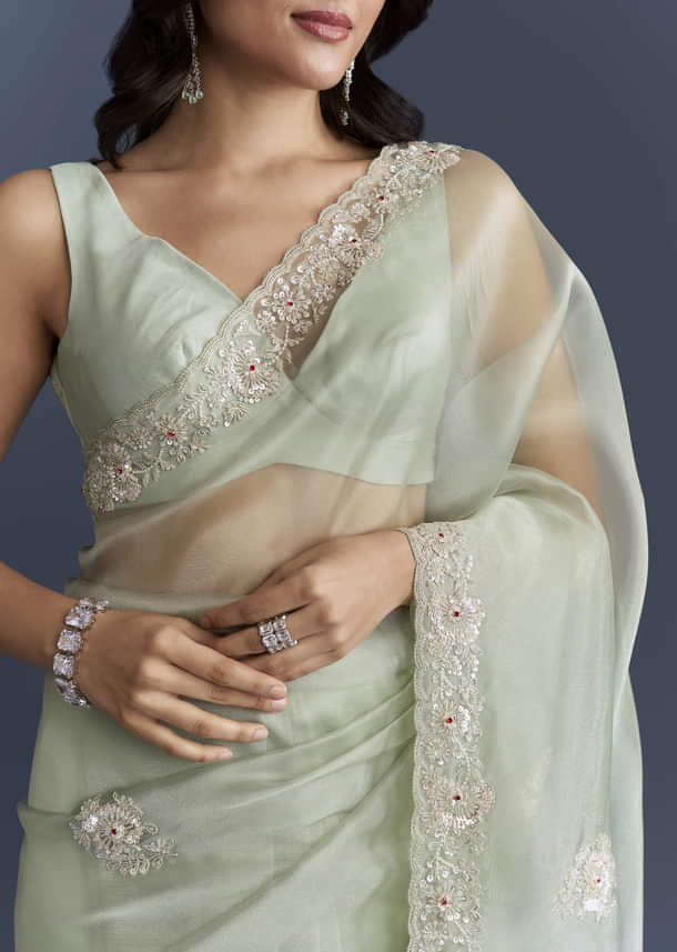 Mint Green Tissue Saree With Heavy Hand Embroidery Mint Green Tissue Saree With Heavy Hand Embroidery
